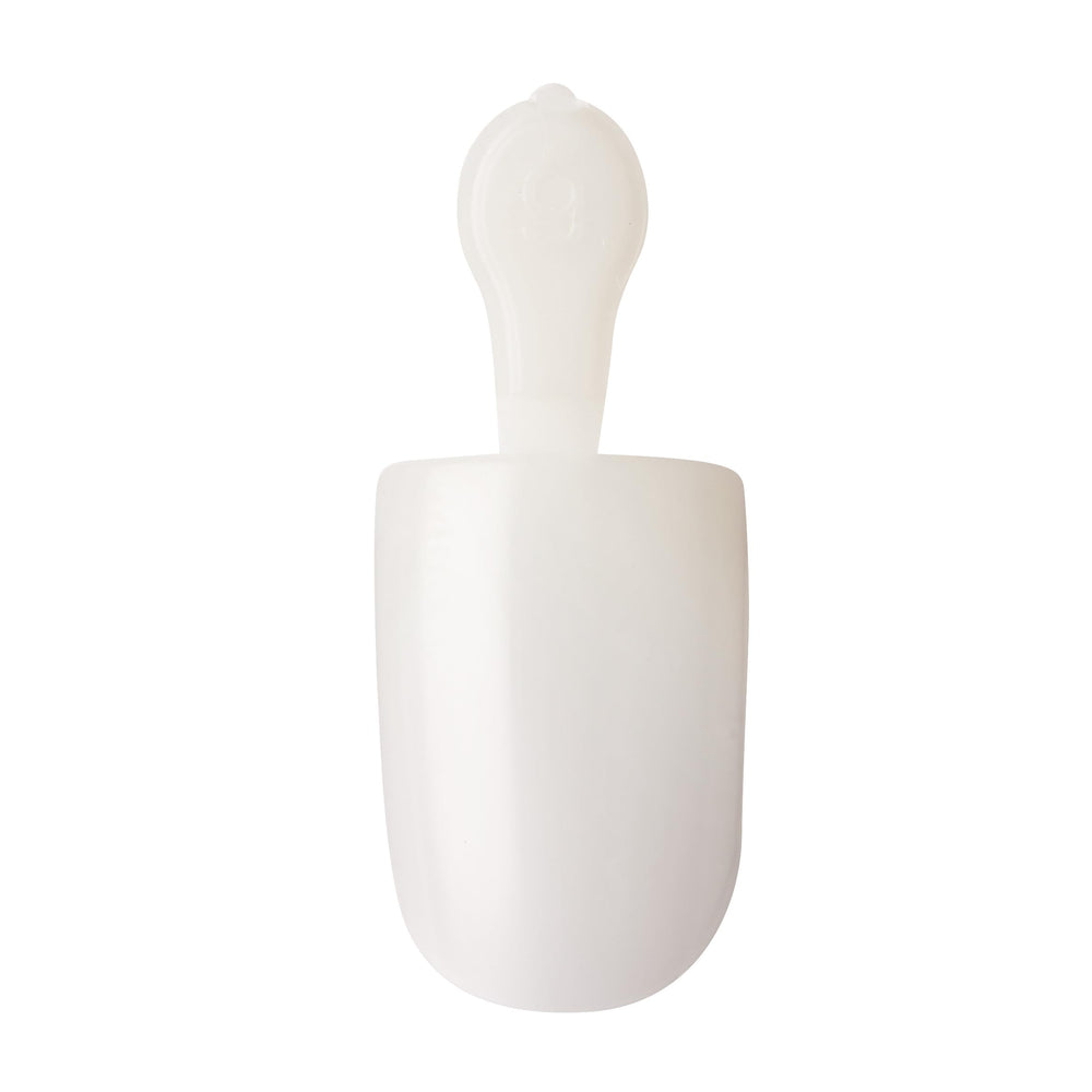 Model applying KISS press-on nails demonstrating easy at-home use and fast salon results