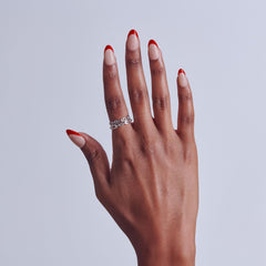 KISS close-up of almond-shaped nail edge for elegant look