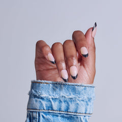 KISS Core top view of black almond nails illustrating smooth finish and coverage