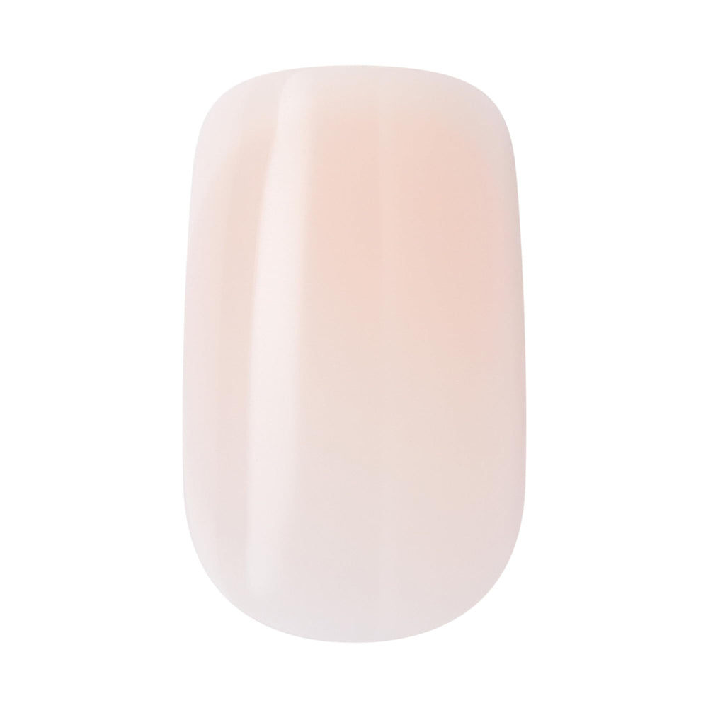 Model wearing KISS core 'My Darling' nails demonstrating natural look and everyday wearability