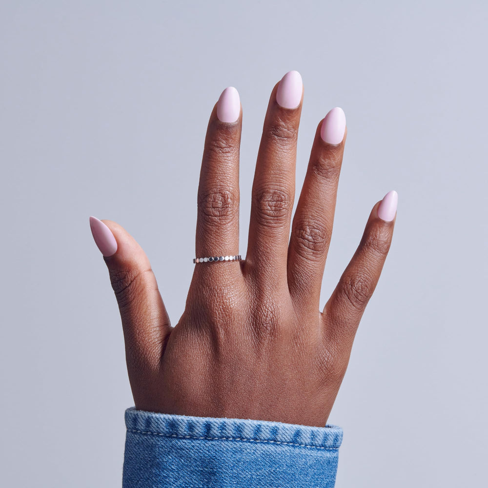 KISS close-up of nail surface showing smooth finish and natural-looking texture