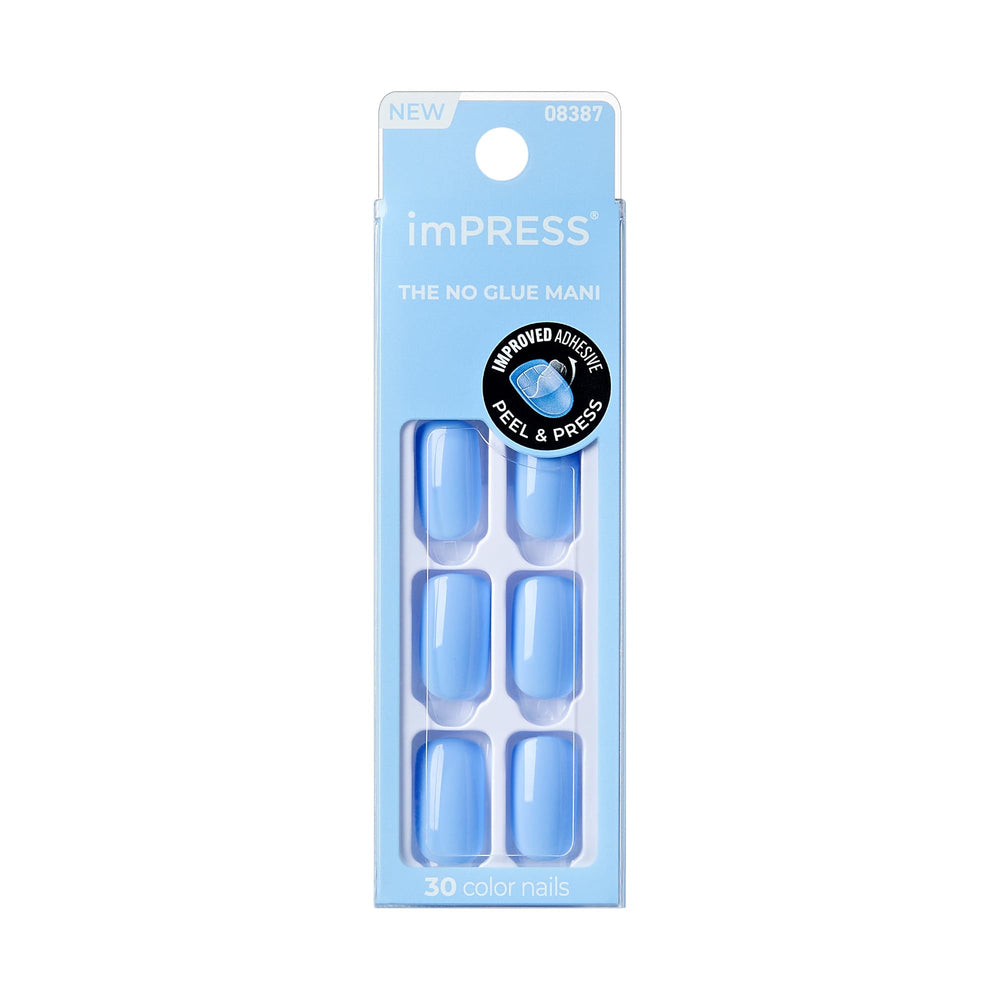 KISS front packaging showing sky blue press-on set and included tools for quick looks