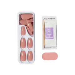 KISS hand applying a press-on nail demonstrating quick application
