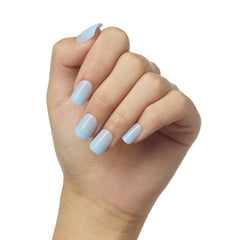 Kiss imPRESS nails on hand beside ruler demonstrating short squoval fit and practical length
