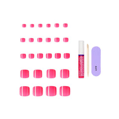 KISS nail glue and mini file laid out demonstrating included application tools