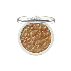 Kiss bronzer brush swatch on forearm demonstrating smooth payoff and buildable coverage