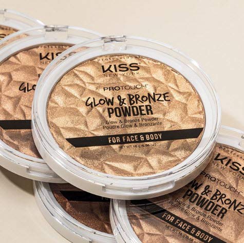 Kiss bronzer held in hand to show pan size and portability useful for body coverage