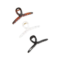 Kitiin clip in use securing a low bun, quick everyday styling benefit