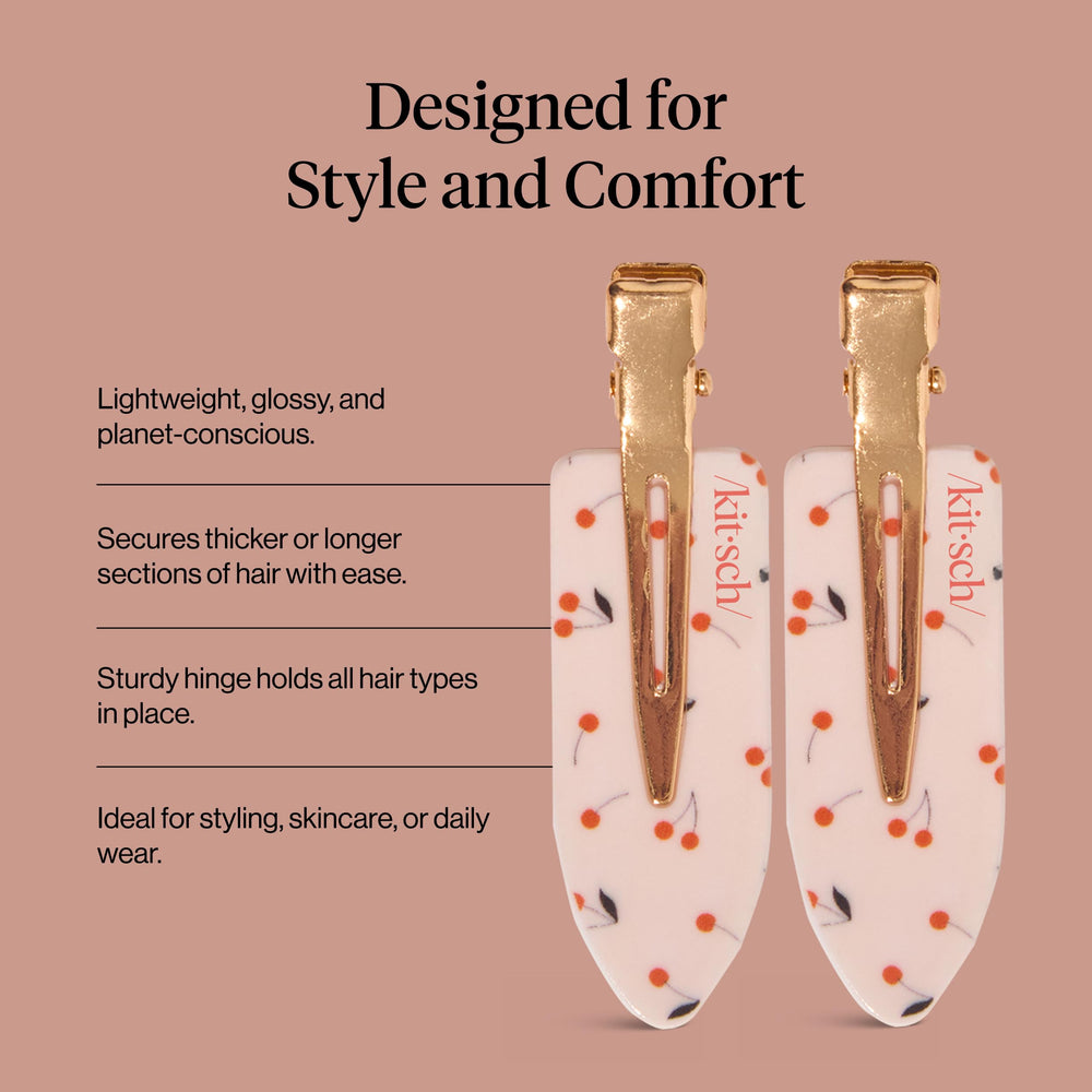 Kitsch clips on model holding bangs back during makeup application for precise work