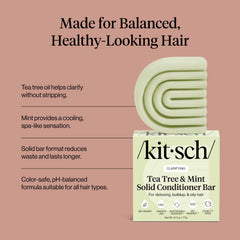Kitsch conditioner bar held in hand to show compact 2.7 oz travel-friendly size