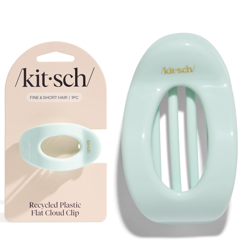 Kitsch clip styled at beach demonstrating secure hold in humid conditions benefit