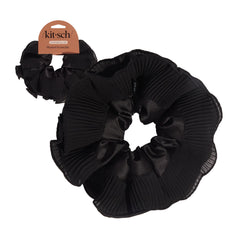 Kitsch front view of scrunchie packaging showing elegant black pleated design and gift-ready look