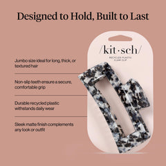 Kitsch jumbo clip held in hand demonstrating size and easy one-handed use