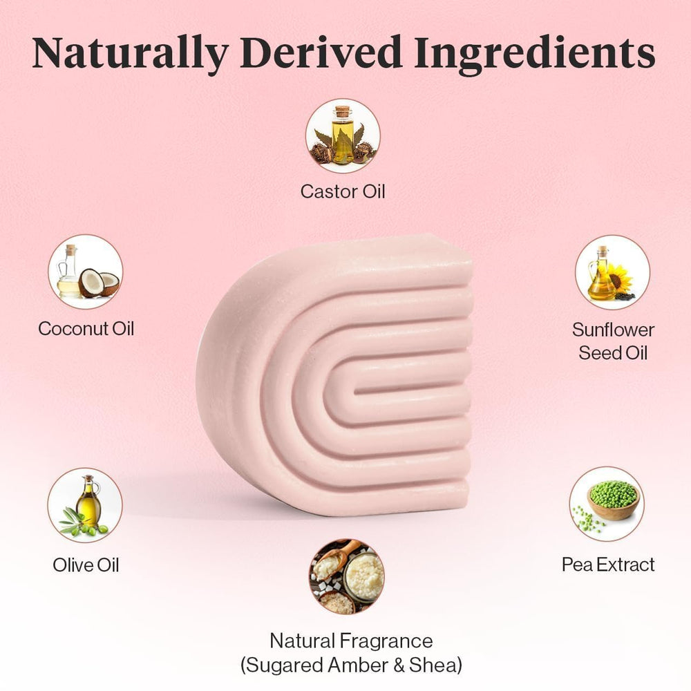 Kitsch applying bar to wet hair, illustrating detangling and frizz control benefit