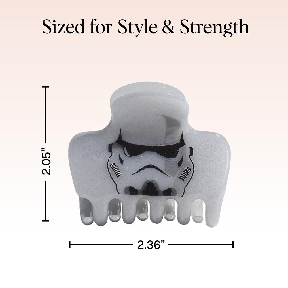 Kitsch Stormtrooper next to hand showing medium size and easy portability benefit