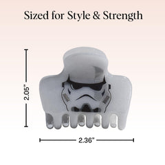Kitsch Stormtrooper next to hand showing medium size and easy portability benefit