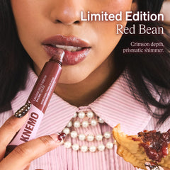 KNEMO gloss on lips lifestyle shot highlighting tint and shine