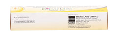 Kojivit tube on bathroom vanity with skincare items suggesting daily routine use