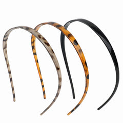 KOVOLITU leopard headband front view showing curved design and comfortable hold