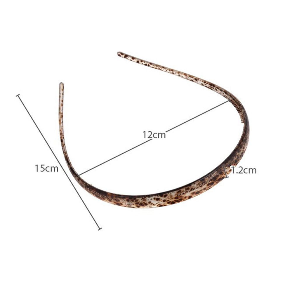KOVOLITU headband worn by model styling hair neatly during daily activities