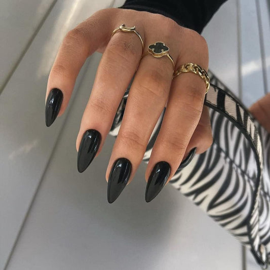 KQueenest front packaging showing 24-piece black almond press-on nails with clear tray benefit