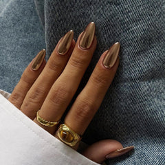 KQueenest front packaging showing 24-piece metallic brown nails and instant glam benefit