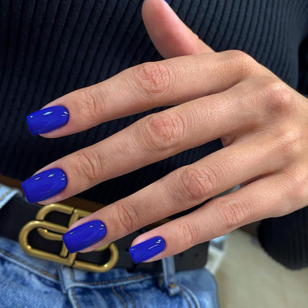 KQueenest close-up of one royal blue nail showing glossy salon finish benefit