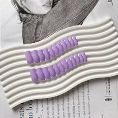 KQueenest side profile highlighting coffin shape for modern silhouette benefit