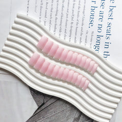 KQueenest side profile showing long square length and sturdy tip strength benefit