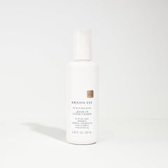 Kristin Ess label detail showing product name and color-safe, sulfate-free benefits