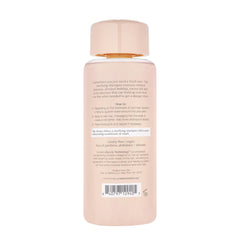 Kristin Ess creamy conditioner texture close-up for hydration benefits
