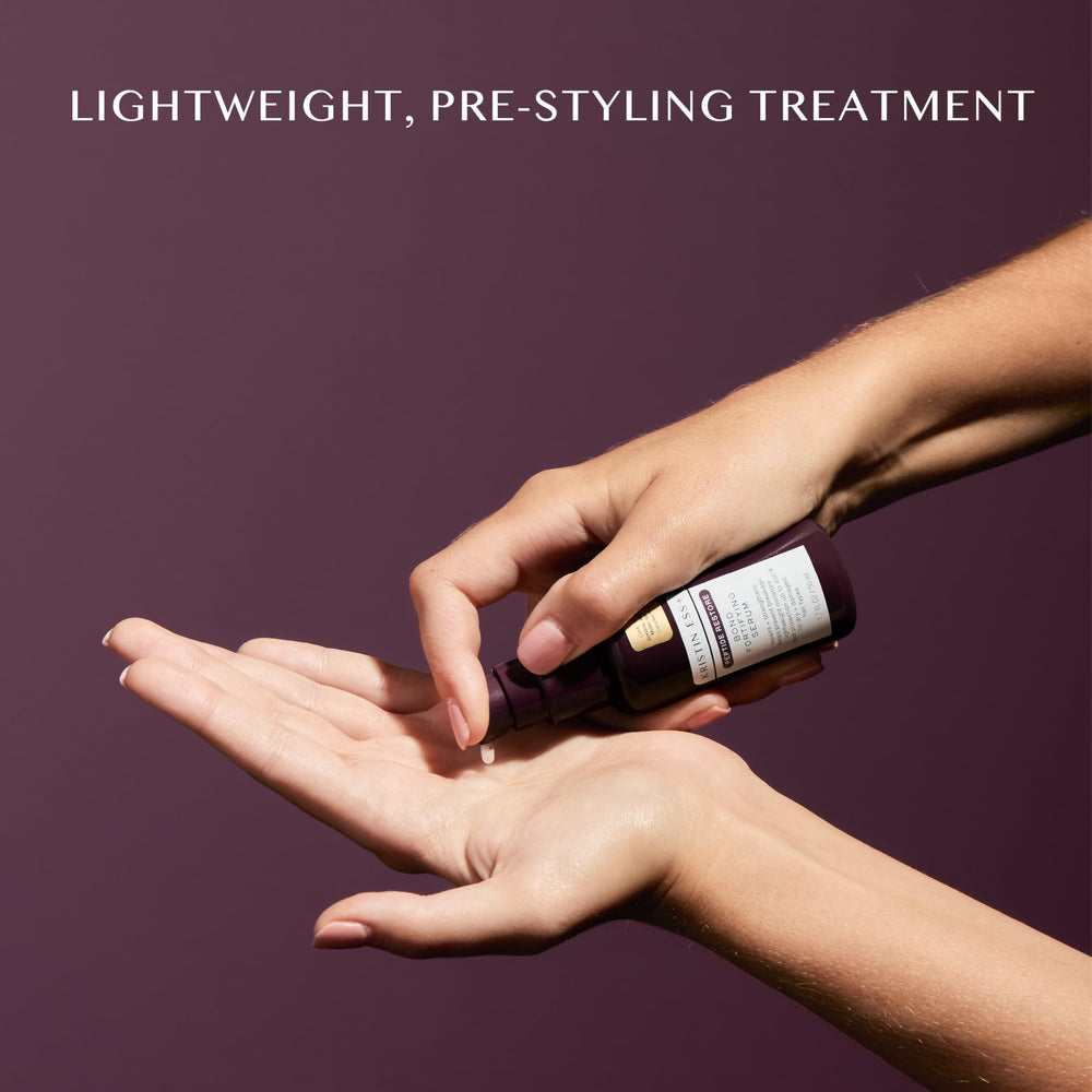 Kristin Ess applying serum to damp hair demonstrating heat-protectant prep benefit