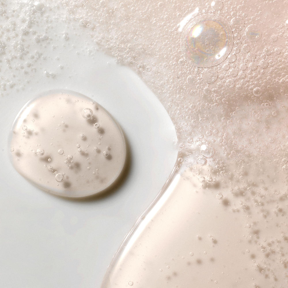 Kristin Ess ingredient detail highlighting Zip-Up Technology for stronger hair