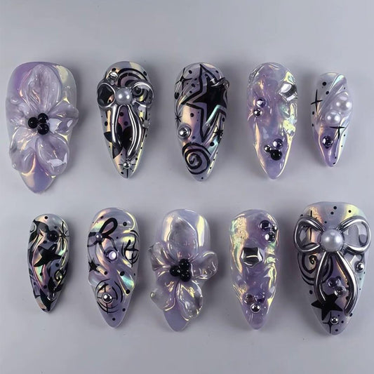 KRTBKR front packaging showing purple flower nails and included tools for convenience