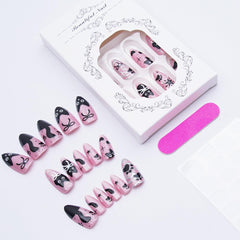 KRTBKR pearls and silver heart accents on nails highlighting elegant texture