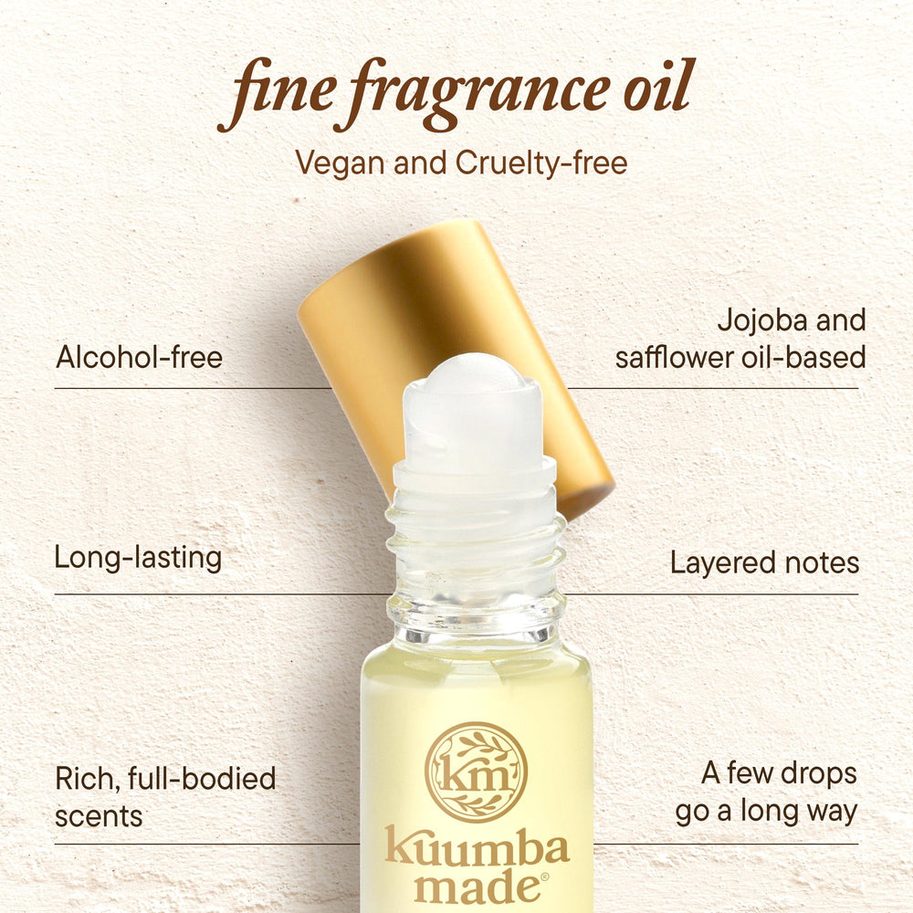 Kuumba Made applied to wrist at pulse point showing subtle long-lasting scent