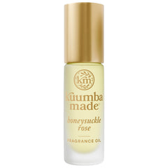 Kuumba Made front roller bottle showing elegant packaging and easy application benefit