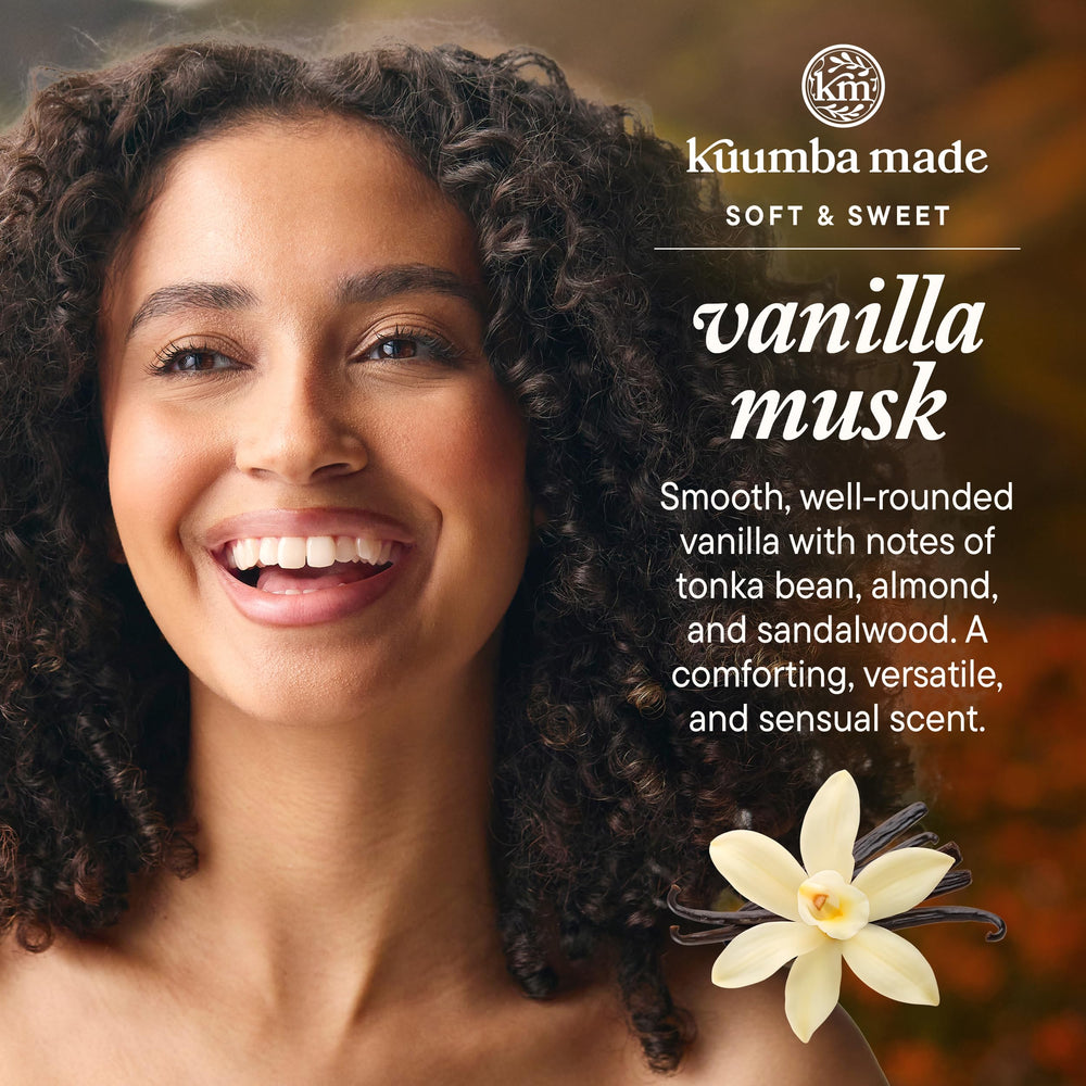 Kuumba Made oil drop on skin showing smooth safflower-oil texture and long-lasting scent
