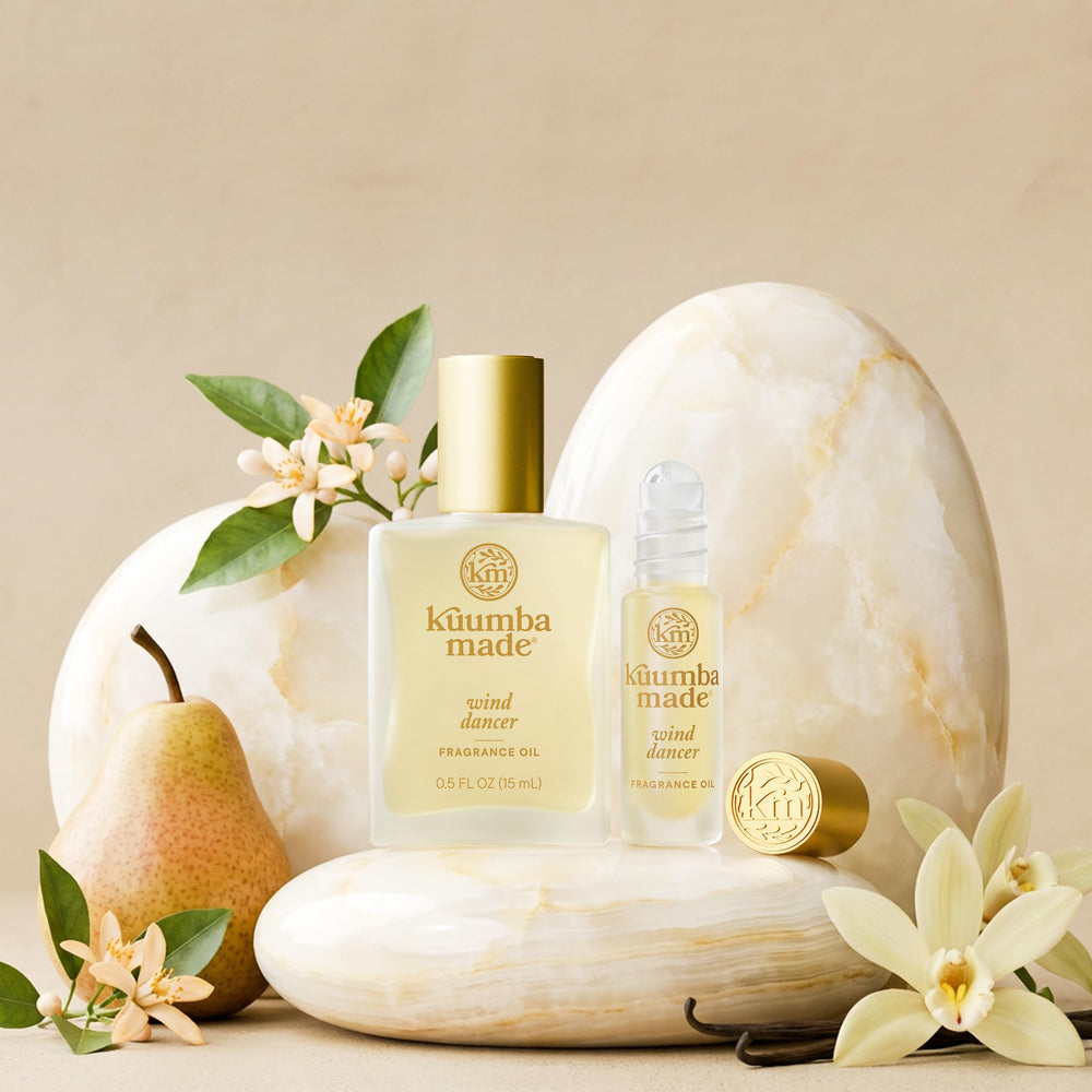Kuumba Made applied on wrist demonstrating wearable scent and long-lasting benefit