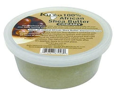 Kuza creamy shea butter texture on spoon, shows rich spreadability benefit