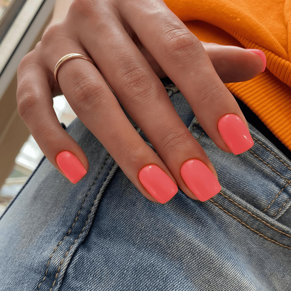 KXAMELIE front packaging showing 24 coral orange press-on nails and quick application benefits