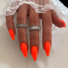 KXAMELIE front packaging showing orange almond nails and kit contents for easy styling