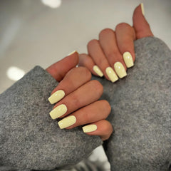 KXAMELIE front packaging showing 28-piece pastel yellow set with tools
