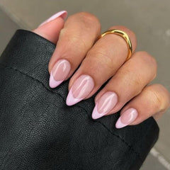 KXAMELIE shown during application with adhesive tab for easy use