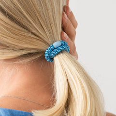 L. Erickson coordinating bead detail preventing fray and adding polish