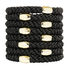 L. Erickson front packaging showing eight black ties and gold bead benefit: stylish and ready