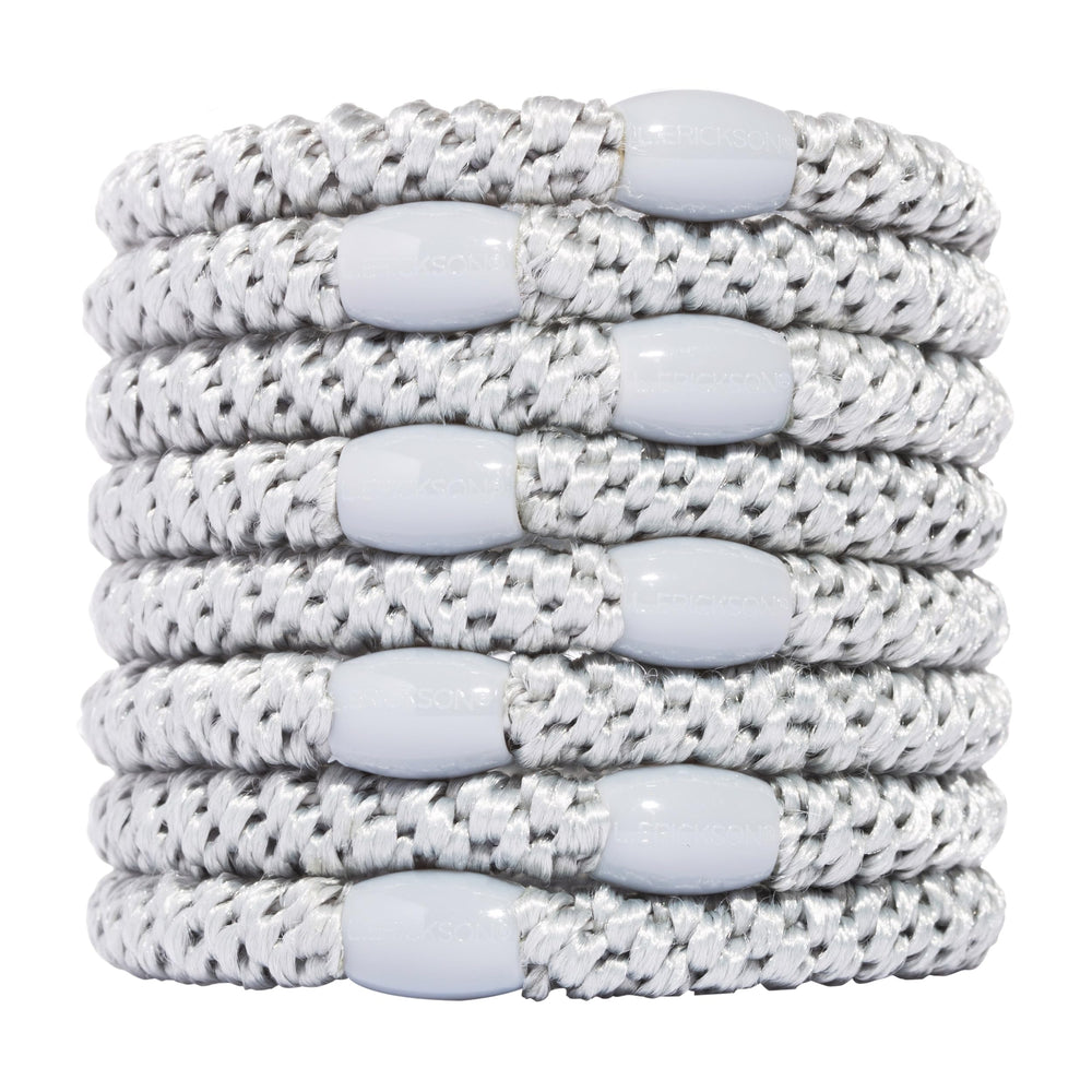 L. Erickson front packaging view showing eight silver hair ties and brand for easy selection