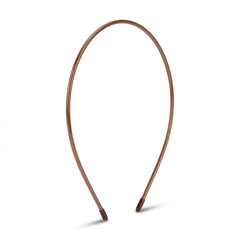 L. Erickson front view of thin tortoise headband showing slim profile and polished look