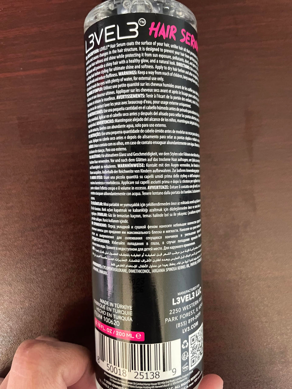 L3 bottle next to a coin showing compact size and travel-friendly benefit