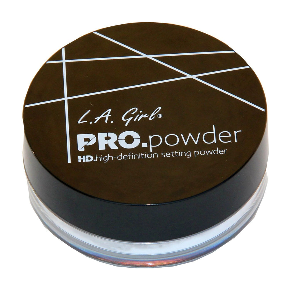 L.A. Girl powder being swept with brush demonstrating smooth application